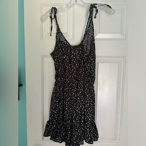 Black/white floral romper w/ adjustable straps